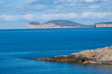View of Capo Caccia from Alghero (L'Alguer), province of Sassari , Sardinia, Italy.  Famous for the...