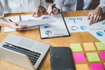 Fototapeta premium Co working conference, Business team meeting present discussing working analysis with financial data and marketing growth report graph in team, Finance, accounting, investment