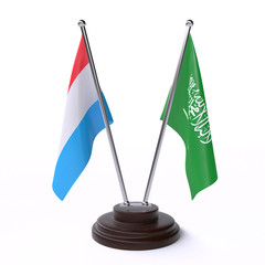 Luxembourg and Saudi Arabia, two table flags isolated on white background. 3d image