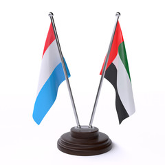 Luxembourg and UAE, two table flags isolated on white background. 3d image