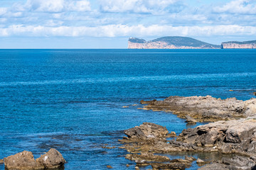 View of Capo Caccia from Alghero (L'Alguer), province of Sassari , Sardinia, Italy.  Famous for the...