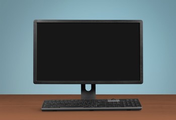 Blank computer monitor at the desk