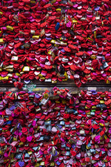 Fototapeta premium Pattern heart-shaped padlocks in Verona