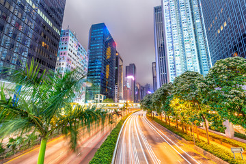 Hong Kong buildings and traffic. City skyline at night. Business concept