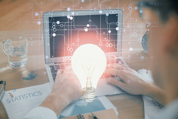 Growing arrows with businessman working on computer on background. Success concept. Double exposure.