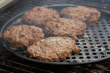 Burger organic beef cutlet fried and cooked on the grill