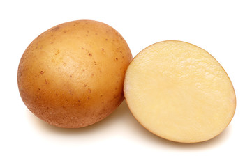 Young potato and half isolated on white background. Harvest new. Flat lay, top view