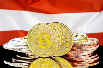 Bitcoins on the background of the flag Austria. Bitcoins on the background of the Austria flag. Concept for investors in cryptocurrency and Blockchain technology in Austria.
