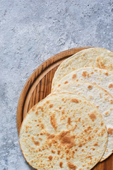 Mexican corn tortillas for sentencing tacos, quesadilla, fajitos, tortilla. View from above.