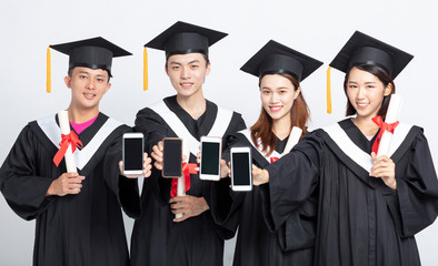 Group of graduate students showing smart phone