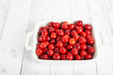healthy food, sweet cherry on a white background, food for vegetarians and vegans