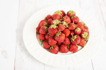 healthy food, strawberries on a white background, food for vegetarians and vegans, ecological products