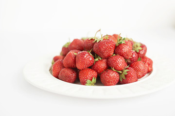 healthy food, strawberries on a white background, food for vegetarians and vegans, ecological products