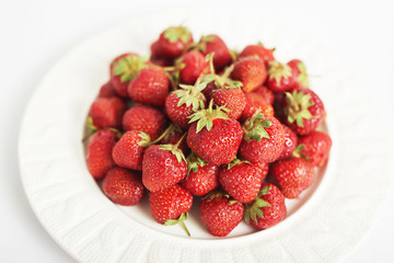 healthy food, strawberries on a white background, food for vegetarians and vegans, ecological products