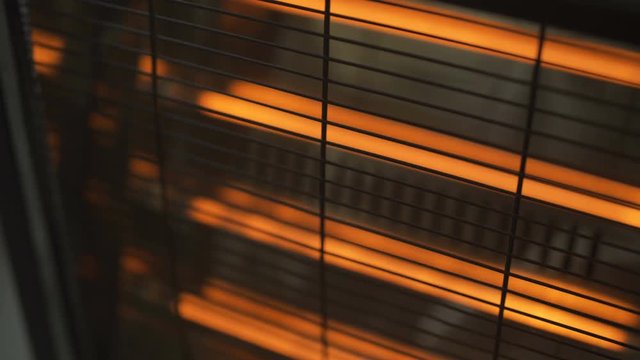 Pan over with focus change on electric radiator
