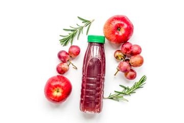 colorful plastic bottle with fruit on white background top view mock-up