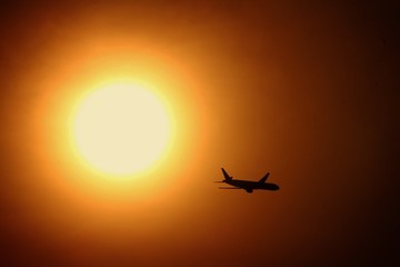 Airplane Silhouette in the sky