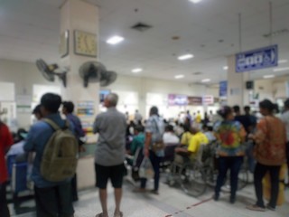 Many patients come to see the doctor and wait for the hospital service .. lens blurred.