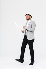 Full length of a confident bearded man builder