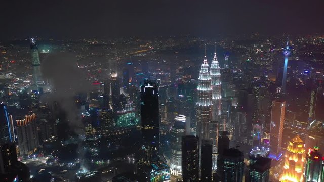 kuala lumpur city night time illuminated downtown aerial panorama 4k malaysia