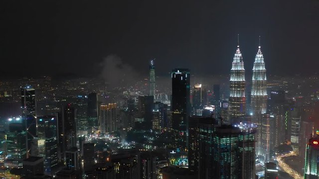 kuala lumpur city night time illumination downtown aerial panorama 4k malaysia