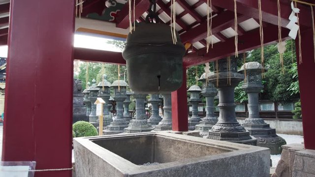 A big wishing bell in front of a temple in Japan
