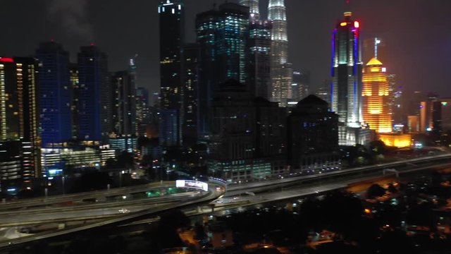 kuala lumpur city night time illumination downtown traffic road aerial panorama 4k malaysia