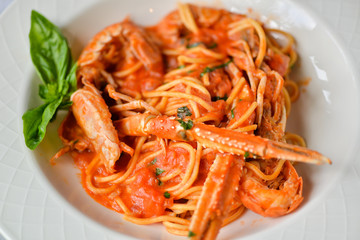 scampi with pasta on a plate