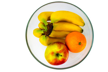 The photo of fresh whole fruits in a glass bowl