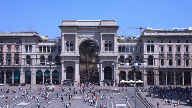 High persepective view of busy entrance to the Galleria Vittorio Emanuele II at Piazza del Duomo, Milan, Lombardy, Italy