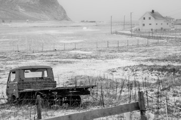 black and white abandoned truck in lofoten norway