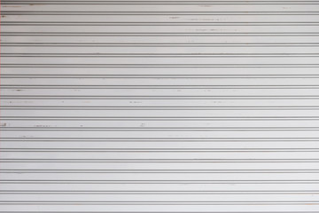 Fototapeta premium An old rolling steel door texture for background.