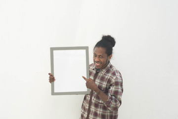 young black man holding white board with isolated background in white
