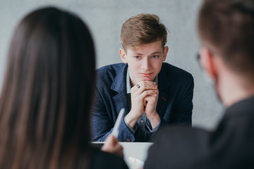 Stressful job interview. Professional career. Human resources. Young male applicant feeling...