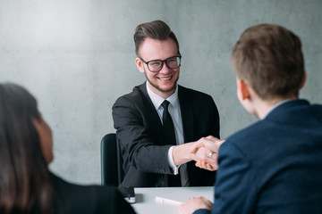 Successful job interview. Professional career. Human resources. Young male applicant got hired for...