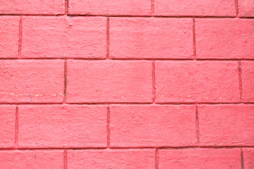 The flap of the house is made of red brick.