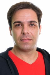 Fototapeta premium Portrait of Persian man isolated against white background