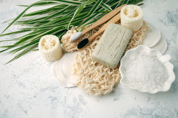 Zero waste bathroom accessories, natural sisal brush, bamboo teeth brush, sea salt, solid soap reusable cotton make up removal pads, eco-friendly bathtime tools