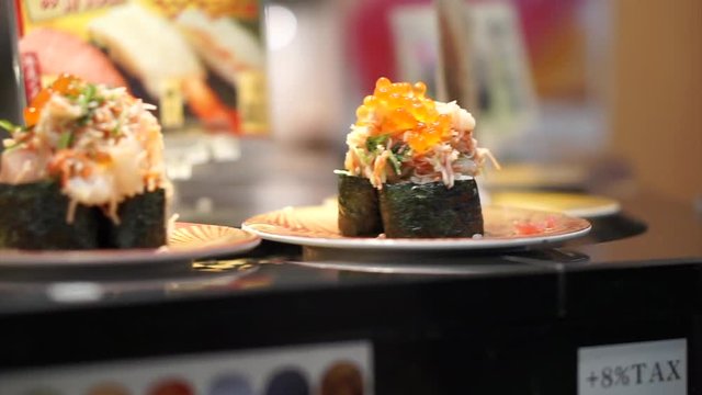 Maki nigiri sushi coveyer belt in Japan