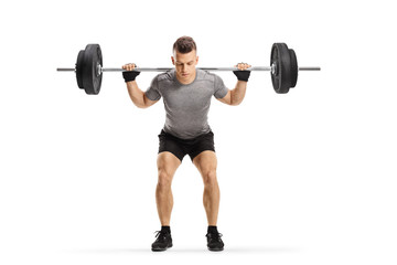 Fototapeta na wymiar Fit guy lifting weights