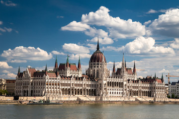 Fototapeta na wymiar Building of the hungarian parliament in a Budapest, capital of Hungary, by the Danube river. One of the landmark of Budapest, and popular tourist destination.