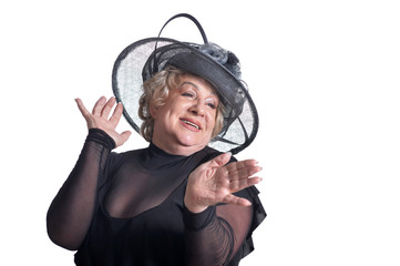 Senior woman in hat posing on white background
