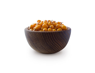  Sea buckthorn in a wooden bowl isolated on white. Fresh ripe berry isolated on white background.