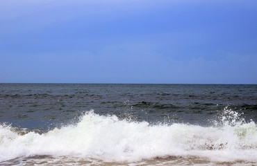 Sea view from tropical beach with sunny sky.  Exotic summer beach with clouds on horizon. Ocean beach relax, outdoor travel