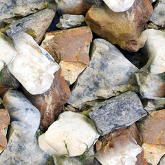 Seamless texture of sea and river stones. Close-up. Seamless photo texture.