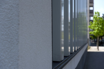 Detail view on facade of office building at Arnulfpark in Munich, Germany 