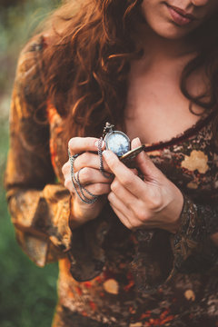 woman looking to the retro clock