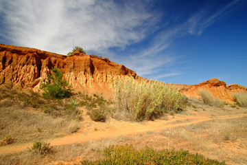 Red rocks on the Praia da Falesia - Falesia beach in Algarve, Portugal.