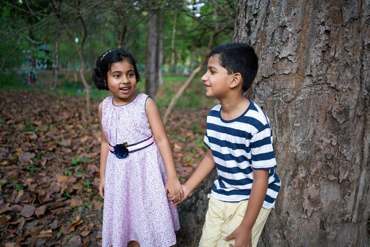 Brother and sister in the forest