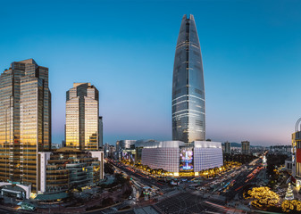 panorama shot of Seoul with colorful skyscrapers at sunset, sout